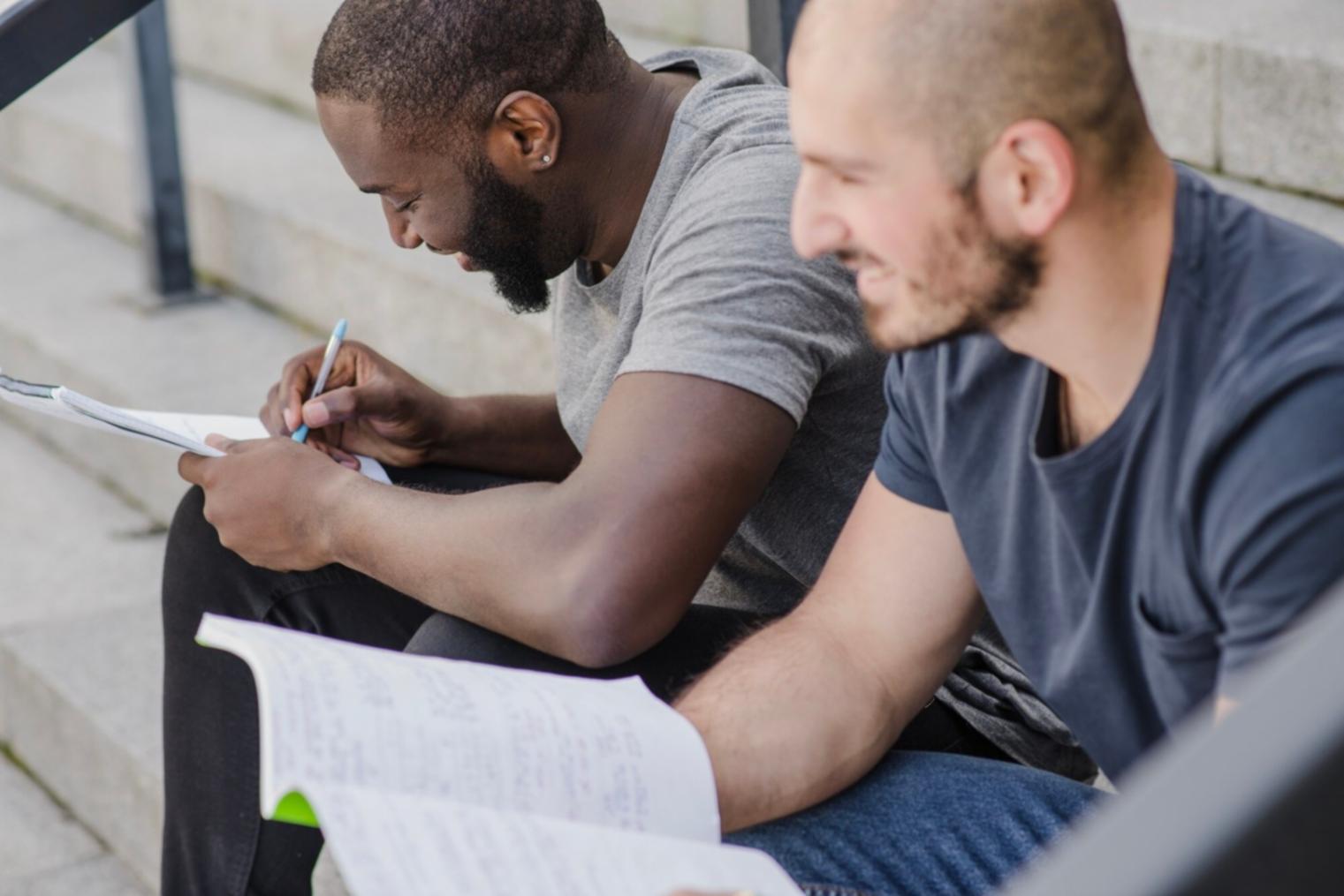 Students reviewing financial statements during workshop